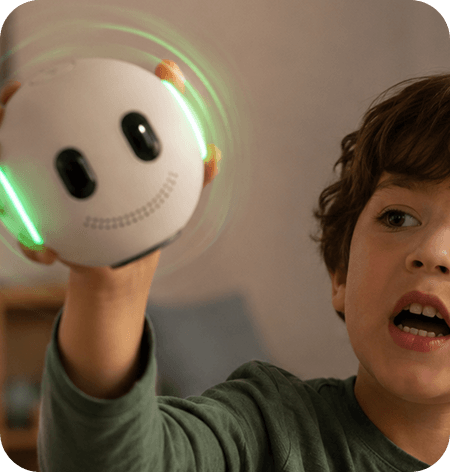 A child activating the KAÏDO sphere during their homework